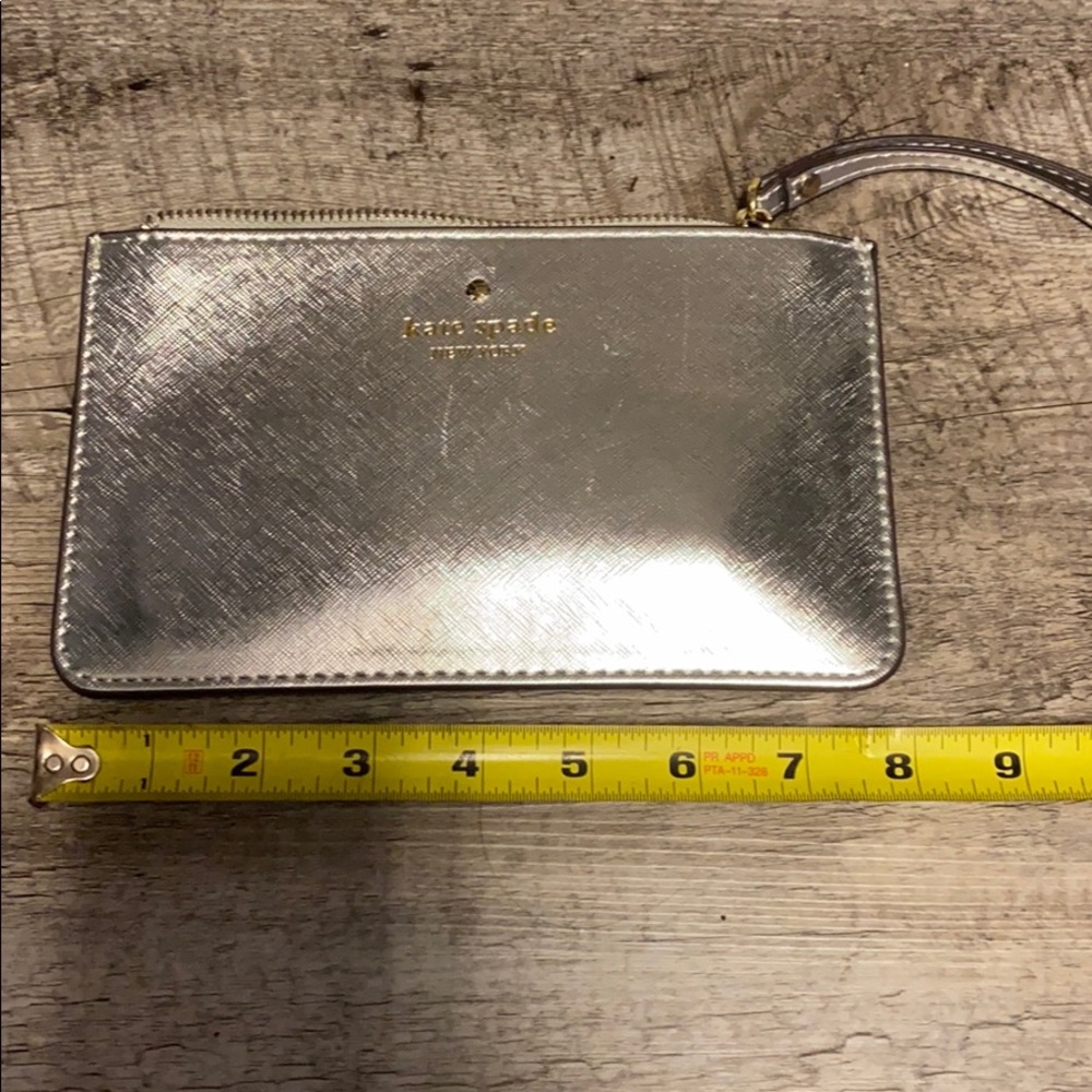 Silver saffiano Kate Spade wristlet